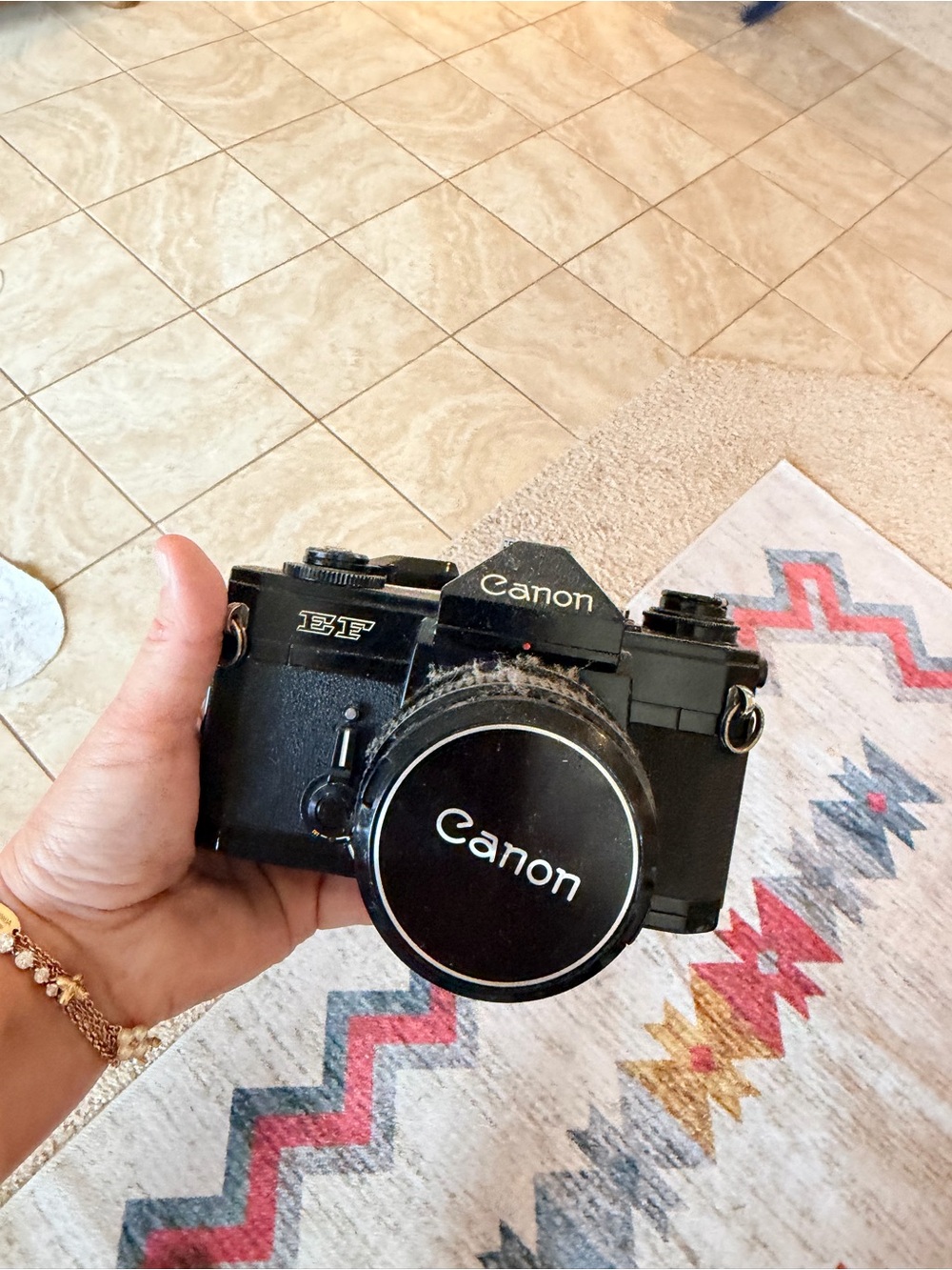 Canon Black 35mm SLR Film Camera with Canon Lens Cap unsure if works or not